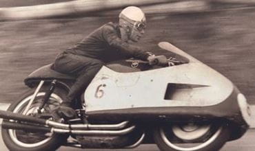 Vintage photo Pierre Monneret on a motorbike 