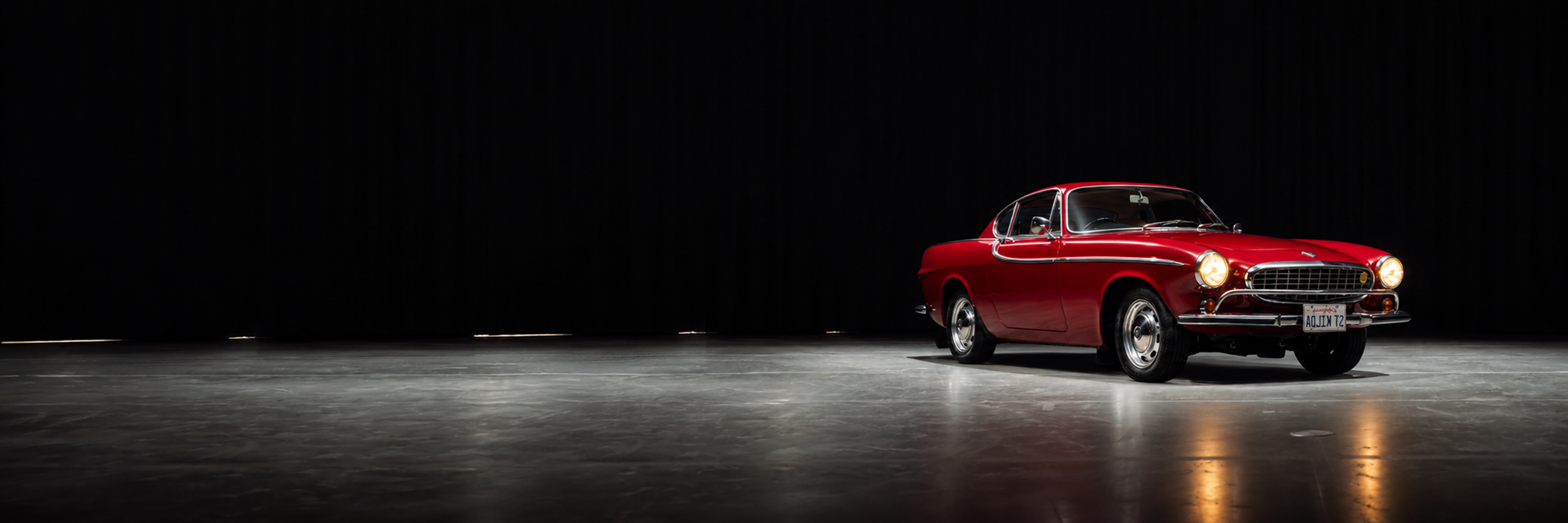 volvo 1800S red with dark fond