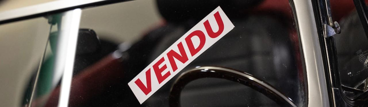 a sold car sign