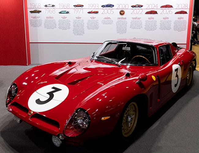 Red Italian sports car at the Rétromobile show